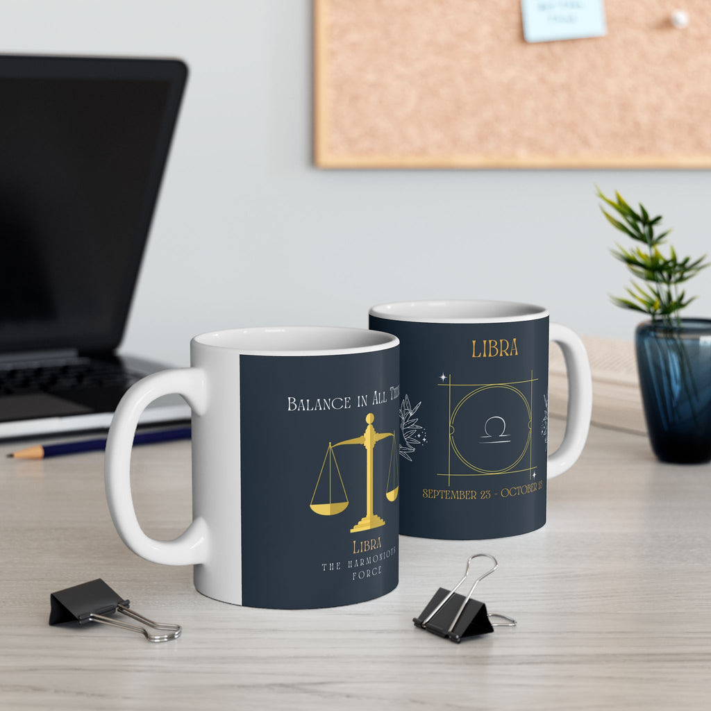 Two mugs with 'Cosmic Cape' design on a desk with office supplies and a plant.
