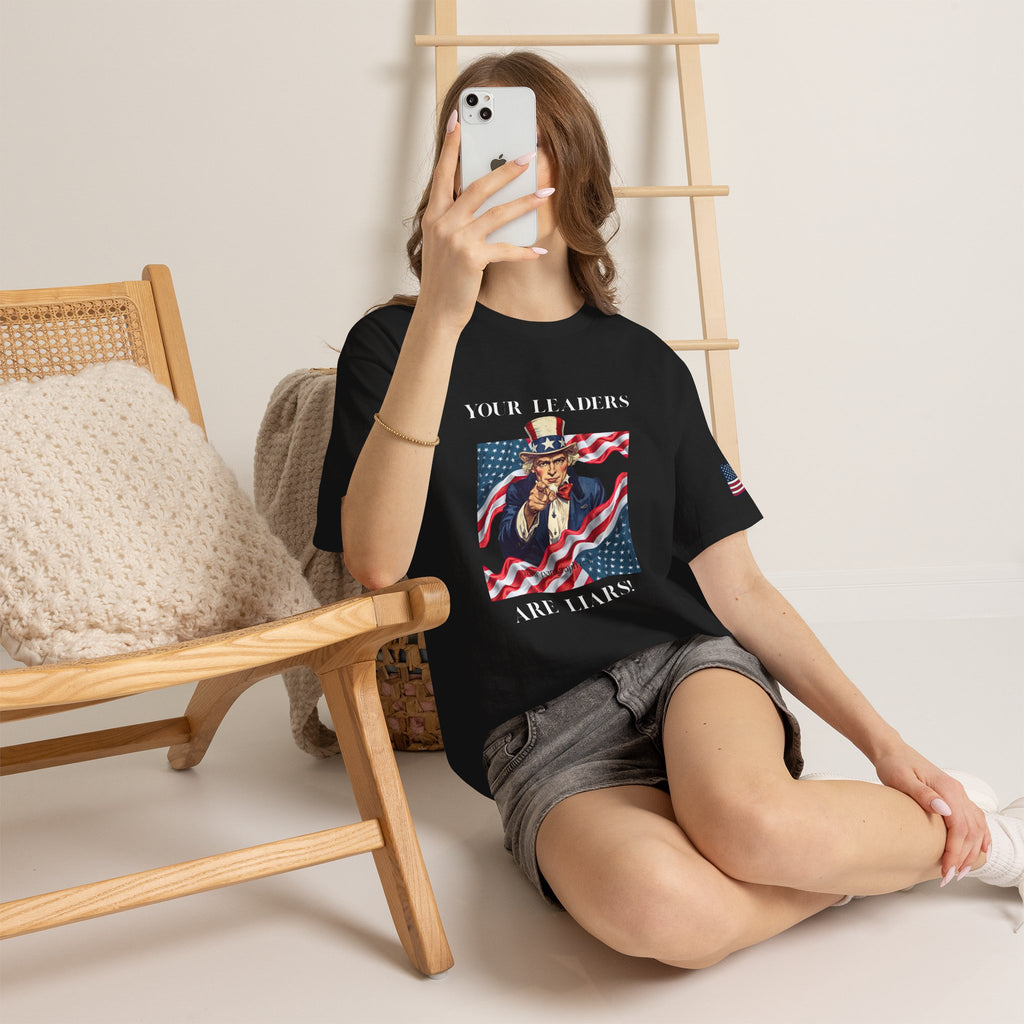 Uncle Sam pointing with American flag background Tee | Your Leaders Are Liars design